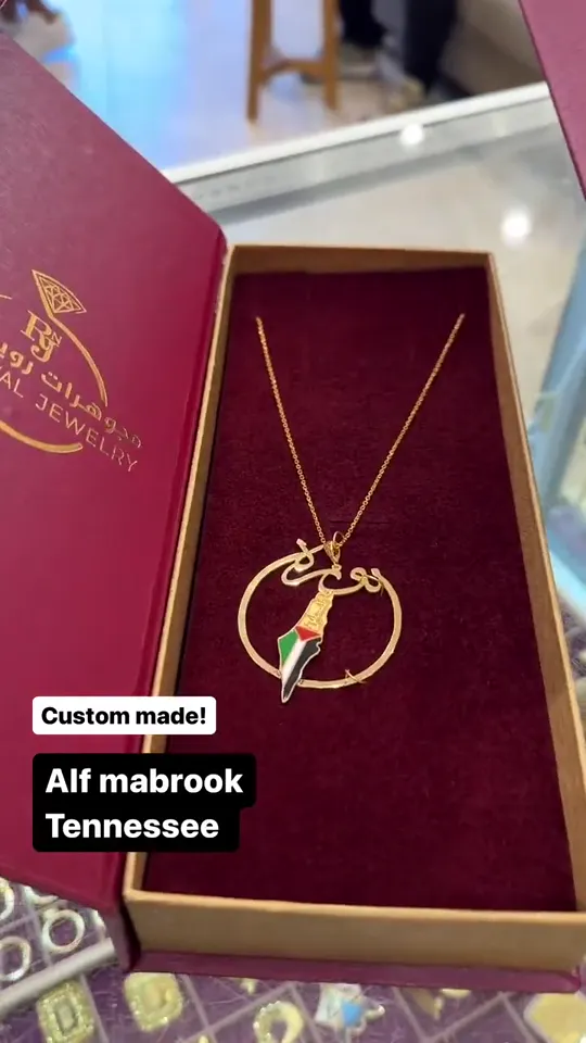 A pendant cut for a graduation, boxed