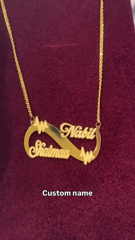 Two names on one plate with a heartbeat